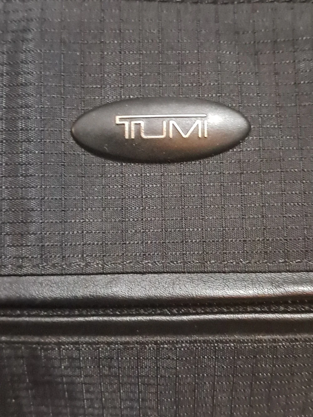 Tumi Black Travel Duffel with Top Handles And Detachable Long Carry Strap